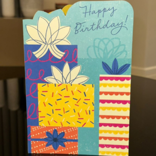 Bright Patterned Gift Boxes Birthday Card